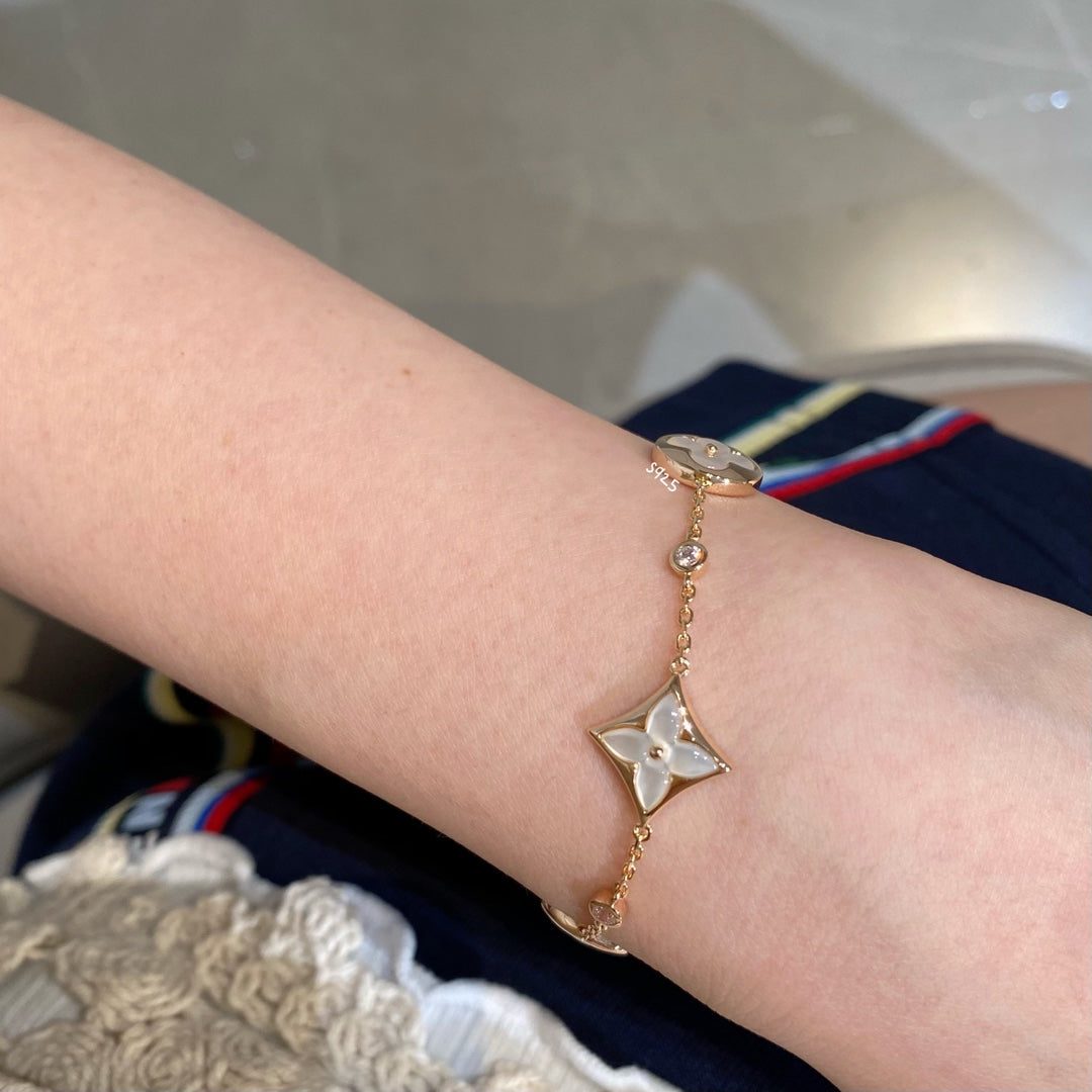 [baslovejewels]STAR AND SUN 4 MOTIF WHITE MOP PINK GOLD BRACELET